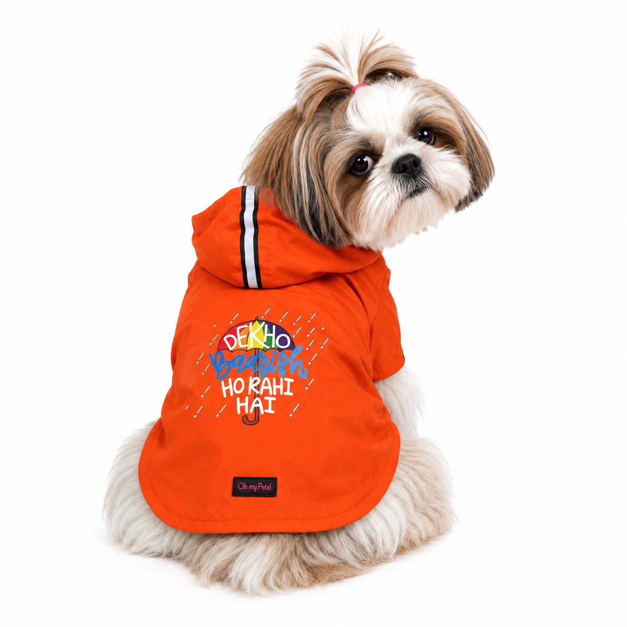 Dog wearing an orange sleeveless raincoat with hoodie. Available in Dehradun