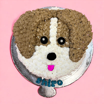 A cake designed to look like a beagle dog, with brown and white frosting for beagles in Doon.